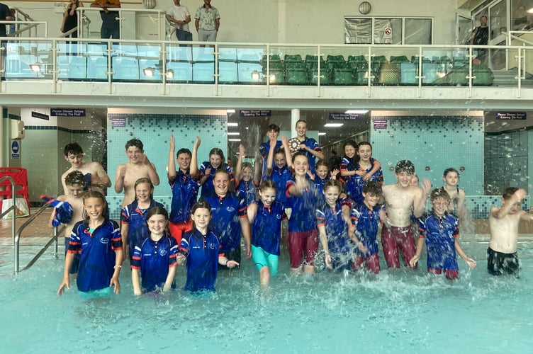 KKSC swimmers celebrate their win in the President’s Shield