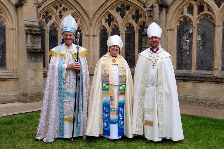 The Rt Rev Moira Astin following her Installation as Bishop of Crediton at Exeter Cathedral with the Bishop of Exeter, the Rt Rev Dr Mike Harrison, left, and right, the Suffragan Bishop of Plymouth, the Rt Rev James Grier.
