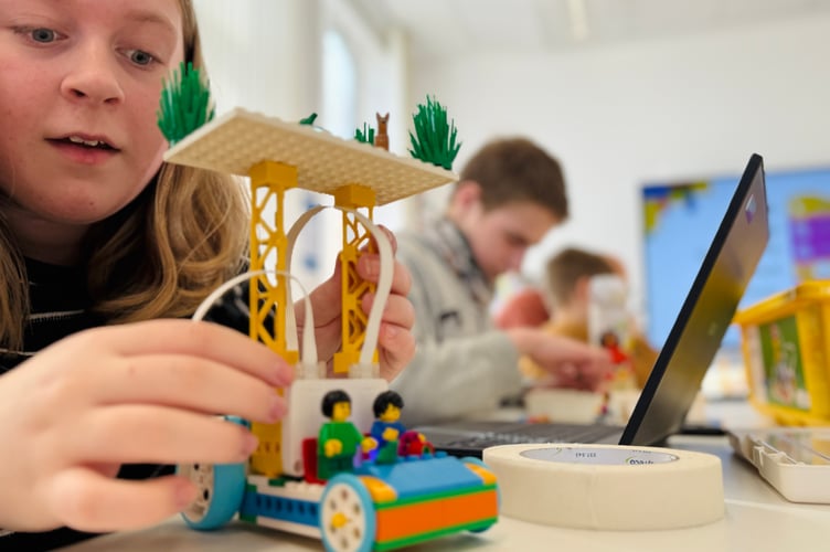 Children enjoying Lego Robotics session at Newton Abbot Library
