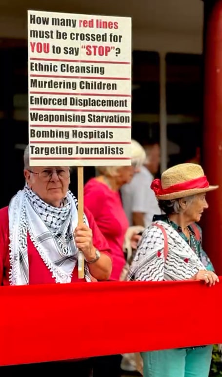 Protesters with their red line