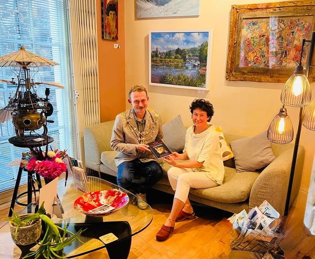 Dentist presents new book to Mayor of Totnes