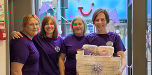 Totnes opticians complete dementia awareness walk