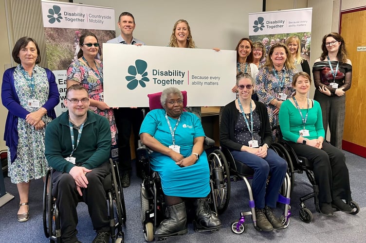 Disability Together team including Stephanie Lewis CEO centre back of photo