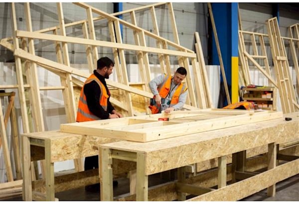 Prisoners building homes scheme.