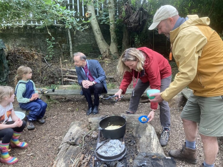 Rt Rev’d Dr Mike Harrison, the Bishop of Exeter talks to the children