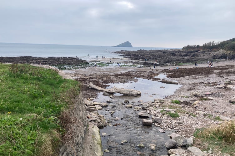 The stream runs down to the sea