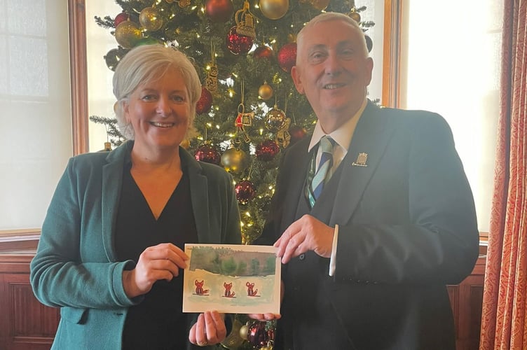 Caroline Voaden and Lindsay Hoyle with Voaden's Christmas Card winner 2025.