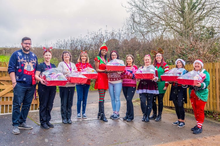 CareYourWay Christmas Elves with their Hampers 