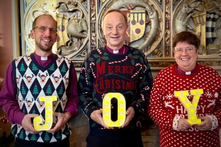 JOY: The Bishop of Exeter, the Rt Rev Dr Mike Harrison, centre, with The Bishop of Plymouth, the Rt Rev James Grier, left and The Bishop of Crediton, The Rt Rev Moira Astin, right.
