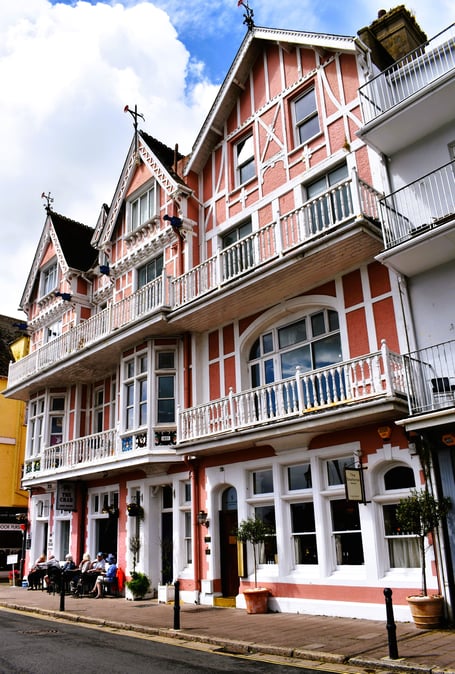 Formerly Raleigh Temperance Hotel & Post Office in Dartmouth now homes The Seahorse Restaurant, The Crab public house, and residential flats.