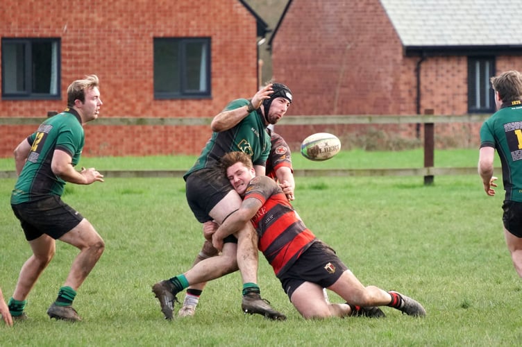      Ivybridge forward Seb Musgrave loses the ball in contact during the defeat at Cully, credit Reith May                          