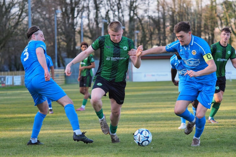 Ivybridge's Kai Burrell in action against Oldland.
