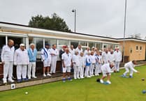Totnes Bowling Club champions get the ball rolling