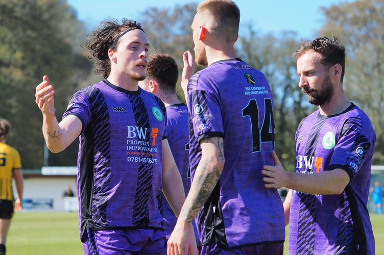 Josh Johnson and Chris Harvey celebrate the Ivybridge opener.