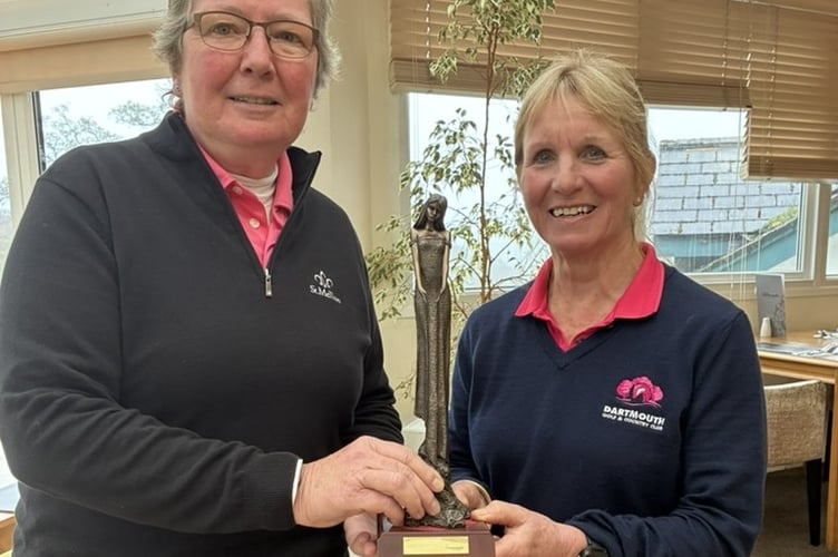 L to R Katy Milne of St Mellion returns the Shona Trophy to Lady Captain Shelley Durrans online