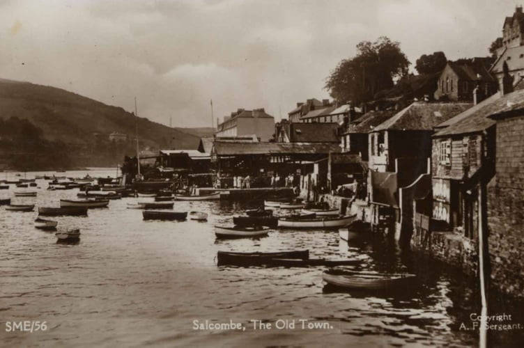Postcard showing Salcombe, the Old Town, with many small boats moored alongside