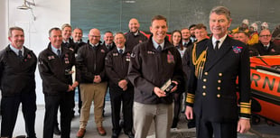 RNLI volunteer surprised with award during Dart station opening