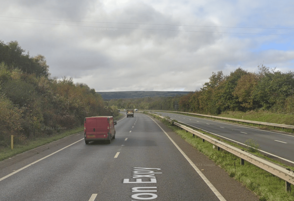Overturned trailer causing delays on A38 