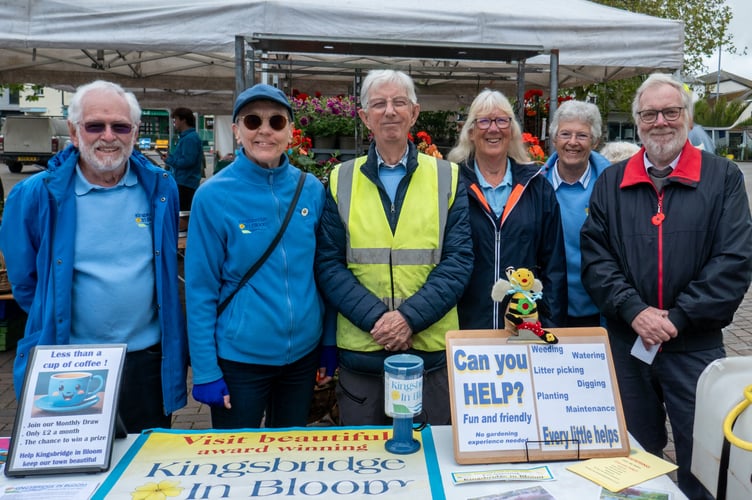 Kibbers by stand and bowser at Kingsbridge Farmers' Market. Volunteers from left to right: John Kinch, Gill Matthews, Brian Hill, Jackie Khosla, Sue Kinch, Piers Rogers.
