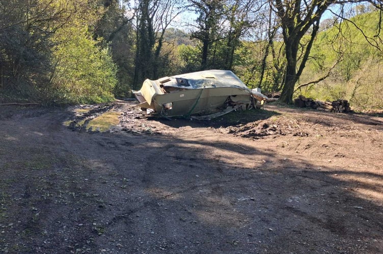 A new photo of the mysterious caravan that was dumped in a South Devon wood two months ago and is expected to be removed this week Image courtesy Anonymous