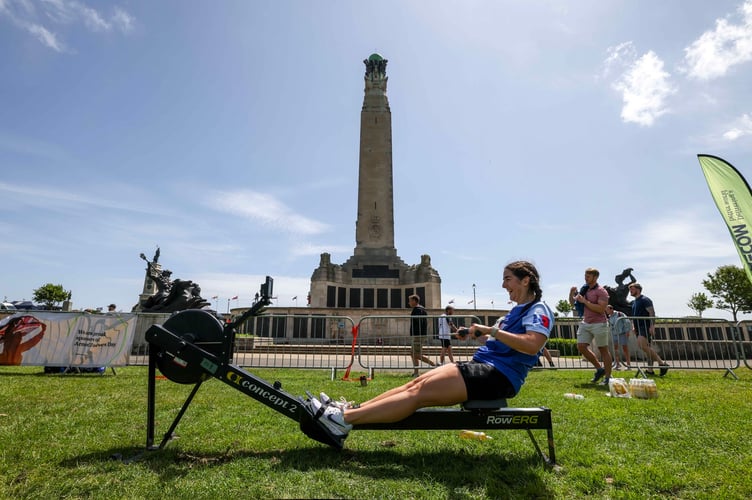 The Tri-Service Rehabilitation Triathlon progresses on Plymouth Hoe, as participants tackle the rowing phase.