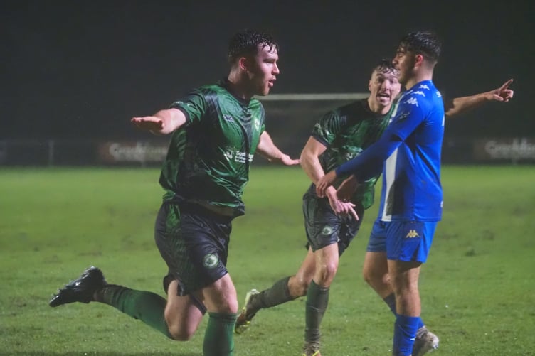 Owen Howard celebrates scoring against Helston