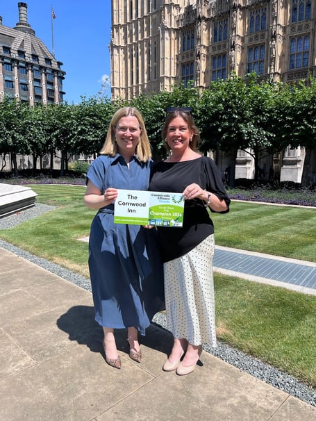 Rebecca Smith MP with winner Tina Forbes, landlady of The Cornwood Inn