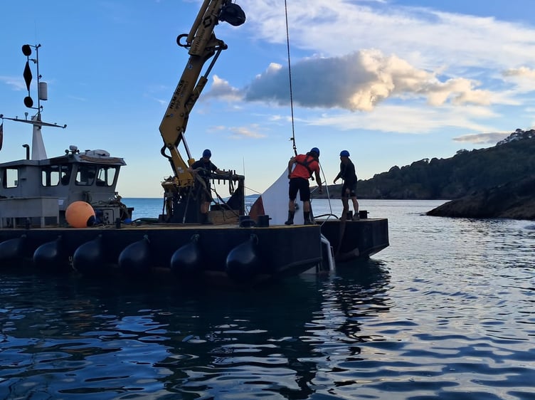 Retrieving the sunken boat