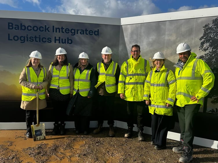 A group gathers at the groundbreaking event